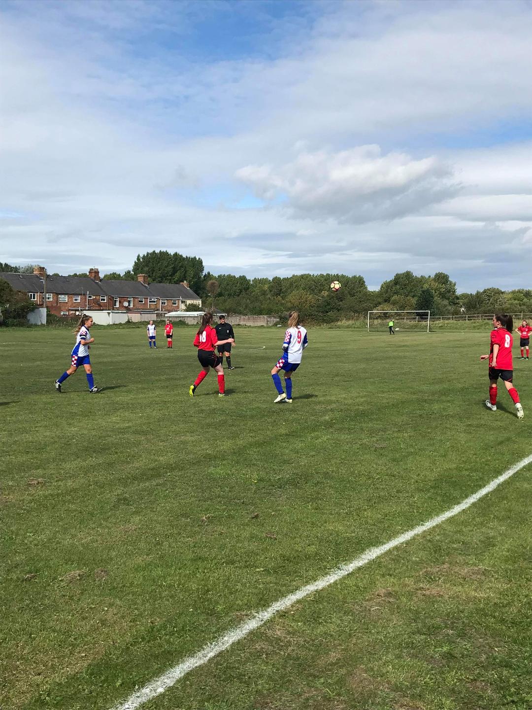 Players looking at the ball in the air
